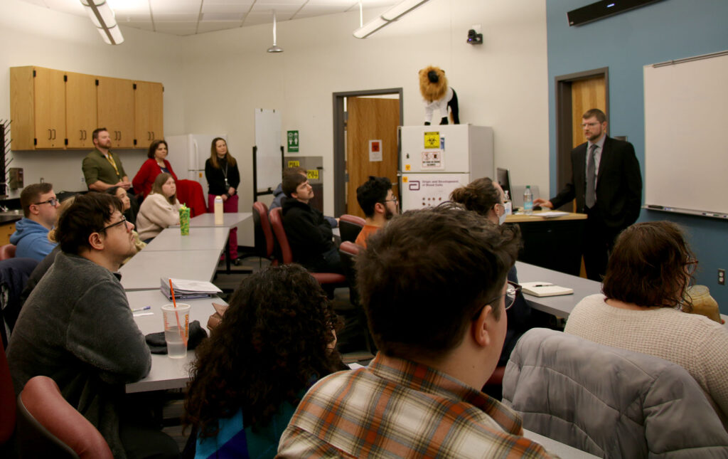 Medical Laboratory Technology students listen as WVU Medicine representatives speak during a classroom visit at Pierpont Community & Technical College in Fairmont, W.Va.