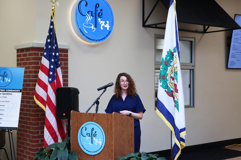 Dani DeVito, president of the Marion County Chamber of Commerce, addresses attendees at the Café ’74 ribbon cutting, emphasizing the importance of partnerships that create opportunity for students while supporting regional workforce and economic growth.