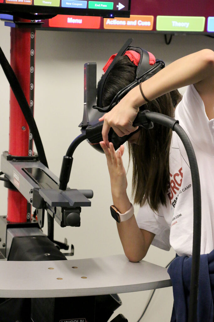 A student participates in Pierpont Community & Technical College’s SparkForce Summer Camps using virtual reality welding technology. The hands-on camp introduces students to skilled trades through immersive, industry-relevant training.