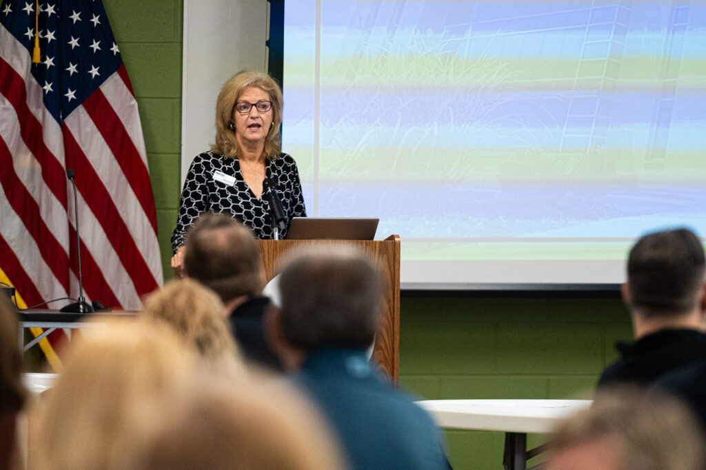Pierpont Photo. Nancy Parks, associate vice president of student services, provides updates on enrollment, student support services and initiatives designed to support student persistence during Professional Development Week All Call Day.