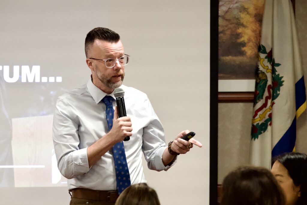 Dr. Michael Waide, president of Pierpont Community & Technical College, speaks during the Harrison County Chamber of Commerce Business@Breakfast on Sept. 4, emphasizing the college's role in preparing students for high-demand careers across West Virginia.
