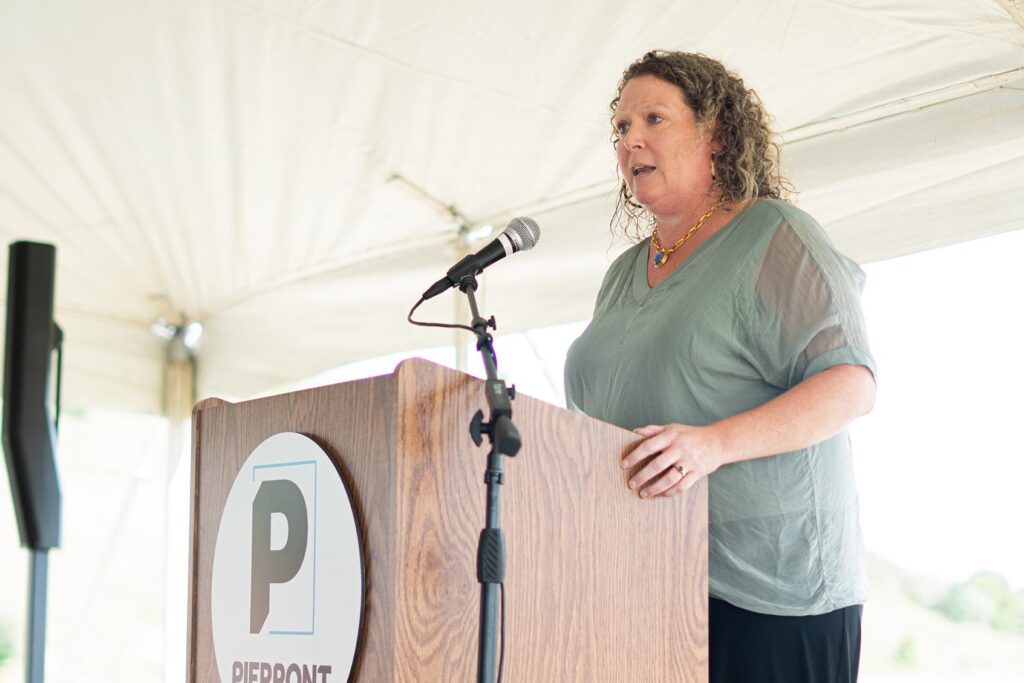 Dr. Sarah Armstrong-Tucker, chancellor of the WVHEPC and WVCTCS, speaks during the groundbreaking ceremony for Pierpont’s new Aviation Maintenance Technology Educational Facility on Sept. 30 at the West Virginia AeroTech Park in Bridgeport.