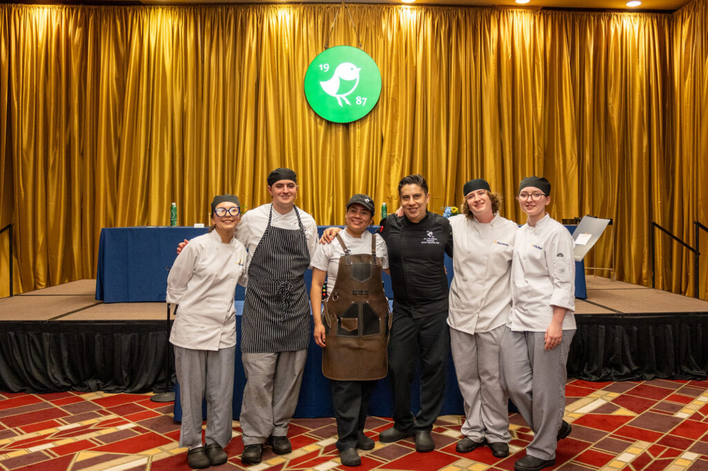Pierpont Community & Technical College culinary student Matthias Freeman, second from left, poses with fellow competitors and chefs following the 3rd Annual WVU Culinary Competition at Nemacolin in southwestern Pennsylvania. Freeman earned Second Place Overall and People’s Choice honors as Pierpont made its first appearance in the competition.