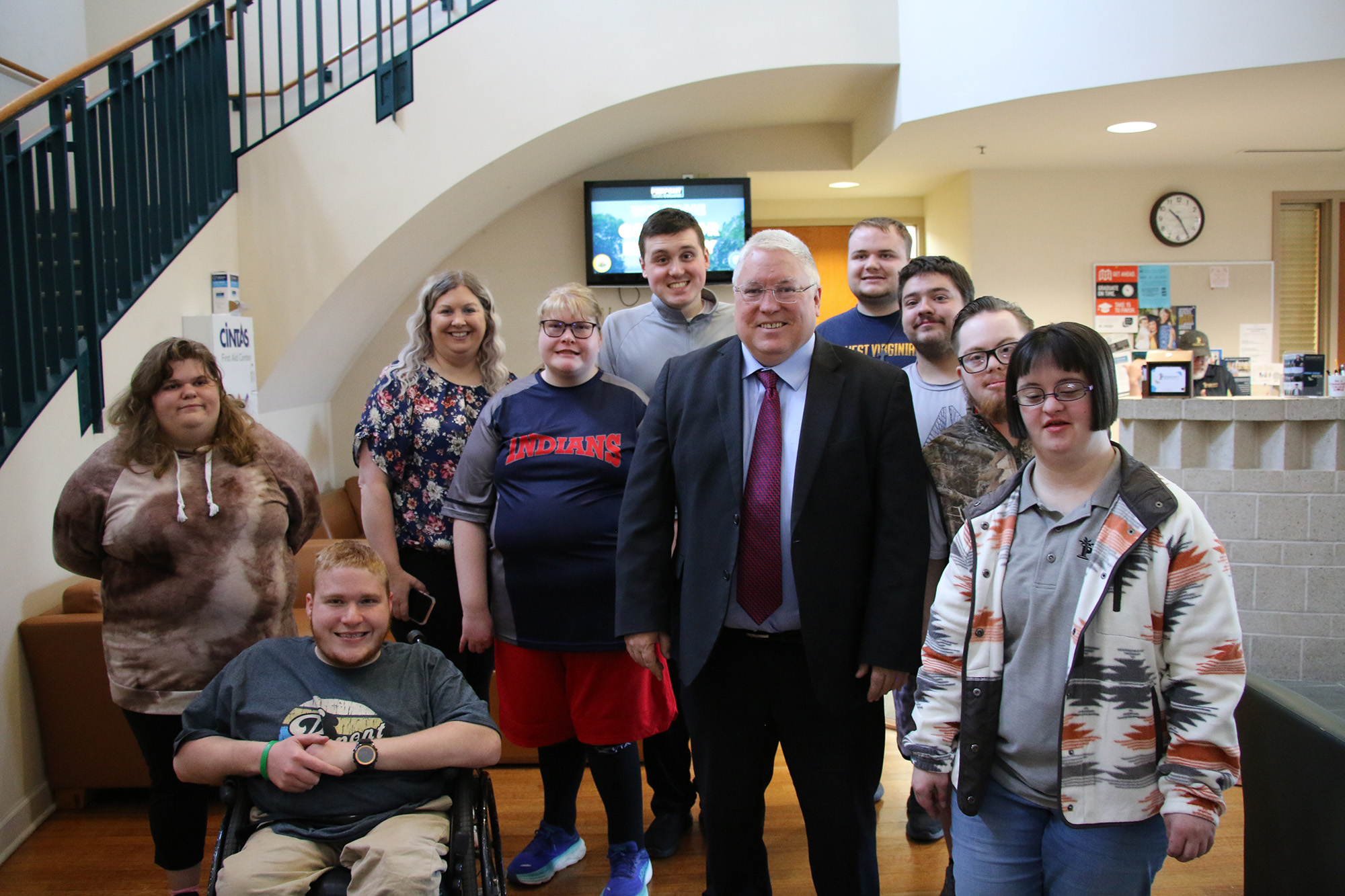 West Virginia Gov. Patrick Morrisey poses for a photo with students from Pierpont Community & Technical College’s PRIDE Academy after a ceremonial bill signing at Pierpont’s Gaston Caperton Center in Clarksburg, W.Va. The PRIDE Academy students provided coffee service during the event as part of their hands-on vocational and workforce training.