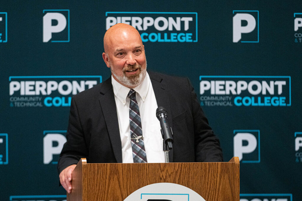 Dr. Mike Davis, President of Fairmont State University speaks during an articulation agreement signing.